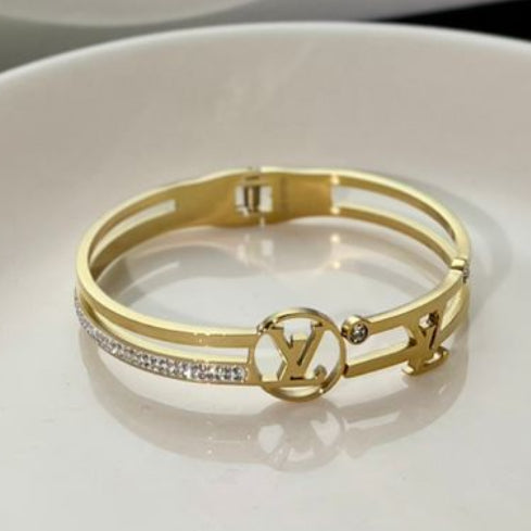 Gold Designer Style Bangle Bracelet with Crystals