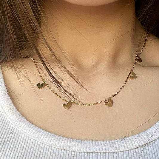 Gold Necklace with Dangling Heart Charms