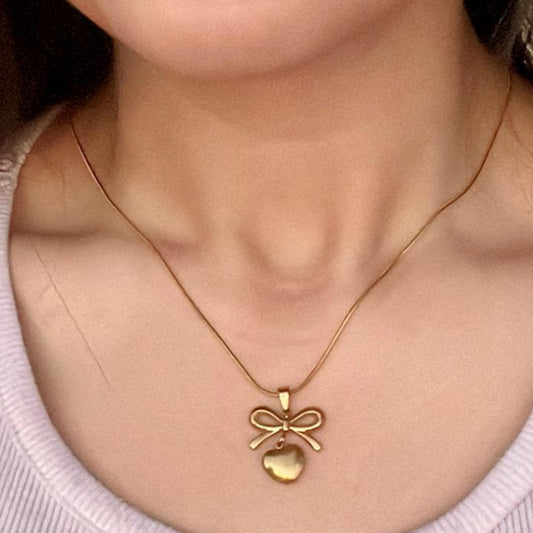Gold Bow Necklace with Heart Charm Delicate Pendant