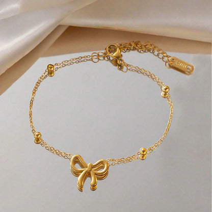 Gold Bow Charm Bracelet