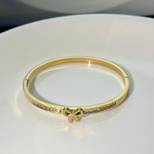 Gold Bow Bangle Bracelet with Crystal Accents