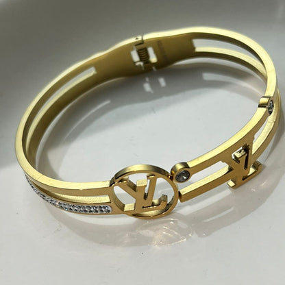 Gold Designer Style Bangle Bracelet with Crystals