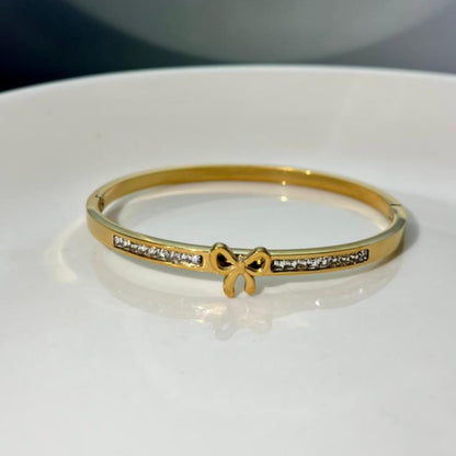 Gold Bow Bangle Bracelet with Crystal Accents